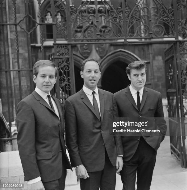 English record producer Joe Meek posed on right with songwriters Ken Howard and Alan Blaikley outside the Royal Courts of Justice in London on 25th...