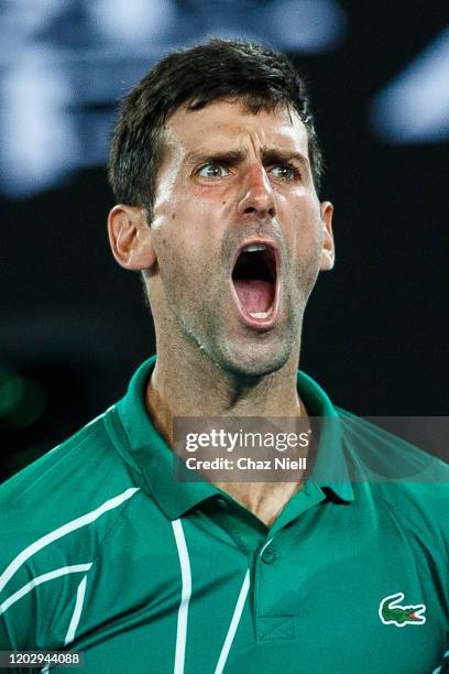 Novak Djokovic of Serbia celerbrates a point in his semi final match against Roger Federer of Switzerland on day eleven of the 2020 Australian Open...