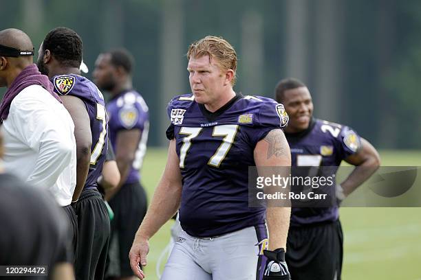 Matt Birk of the Baltimore Ravens works out during training camp on July 29, 2011 in Owings Mills, Maryland.