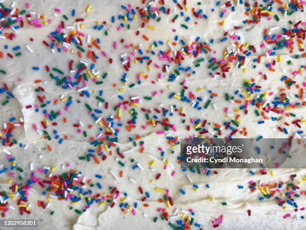 sheet cake and rainbow sprinkles - hundreds and thousands stock pictures, royalty-free photos & images