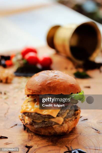 delicious double cheeseburger on wood background - camel meat stock pictures, royalty-free photos & images