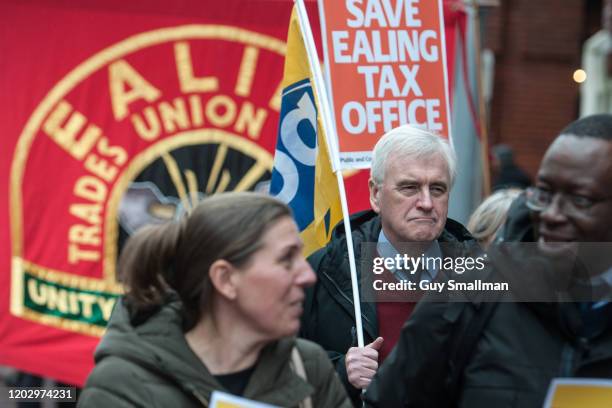 Ealing tax office workers march from their office to a rally and are joined by John McDonnell MP on January 30, 2020 in London, England. Workers at...