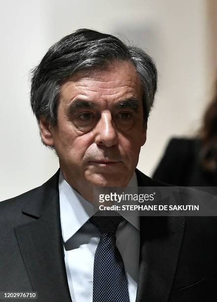 Former French prime minister Francois Fillon arrives at Paris courthouse for his trial on February 24, 2020. - Francois Fillon goes on trial over...