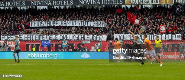 Supporter of 1.FC Nuernberg are seen with banner during the Second Bundesliga match between 1. FC Nuernberg and SV Darmstadt 98 at...