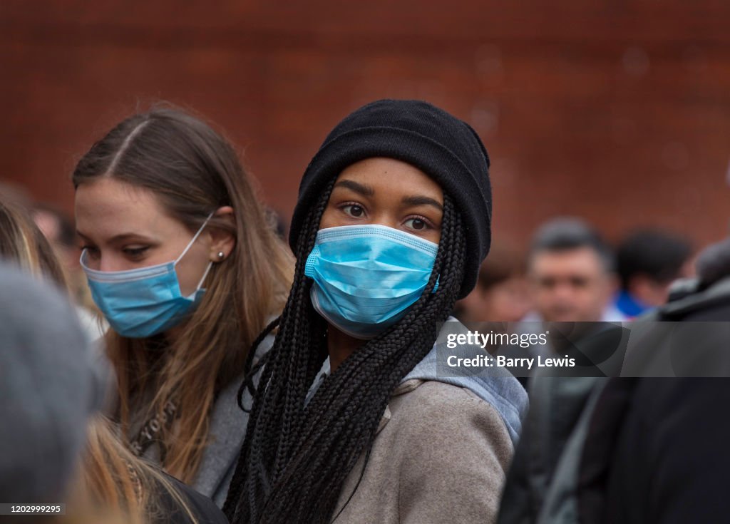 Girls Wearing Masks As Defence Against Coronovirus In Chinatown London