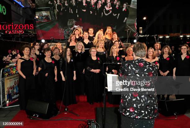 The Military Wives Choir performs at the UK Premiere of "Military Wives" at at The Cineworld Leicester Square on February 24, 2020 in London, England.