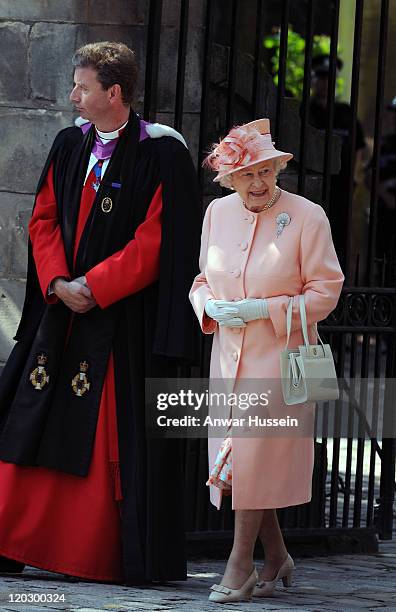 Queen Elizabeth ll attends the wedding of Zara Phillips and Mike Tindall at Canongate Kirk on July 30, 2011 in Edinburgh, Scotland.