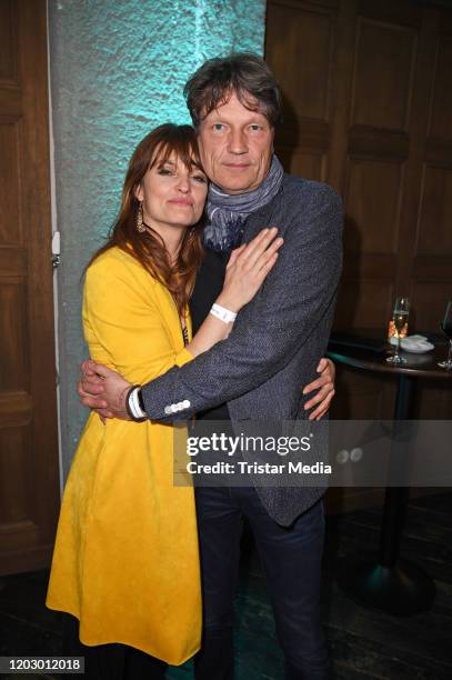 Ina Paule Klink and her partner Roland Suso Richter at the Bavaria Fiction Cocktail during the 70th Berlinale International Film Festival Berlin at...