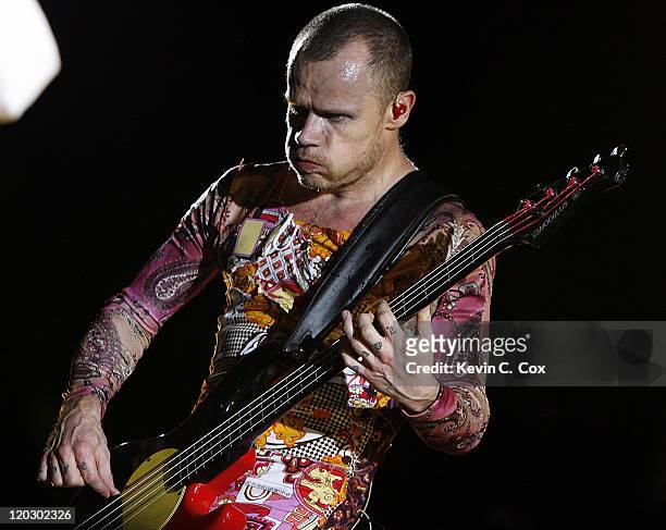 Flea playing Bass Guitar of The Red Hot Chili Peppers performing during the Red Hot Pit Stop in the NASCAR NEXTEL Cup All-Star Challenge Saturday,...