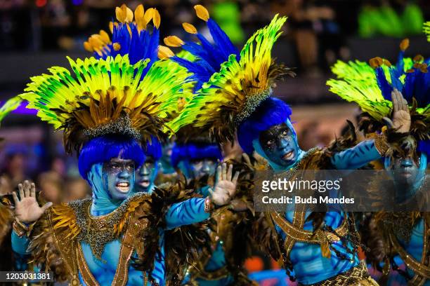 Members of Unidos de Vila Isabel samba school perform during the second night of 2020 Rio's Carnival Parades at the Sapucai Sambadrome on February...