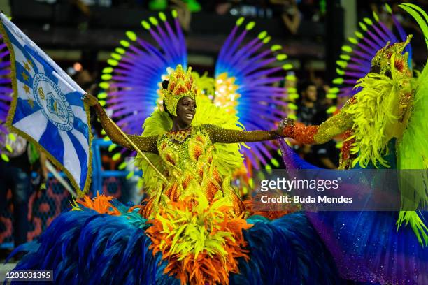 Members of Unidos de Vila Isabel samba school perform during the second night of 2020 Rio's Carnival Parades at the Sapucai Sambadrome on February...