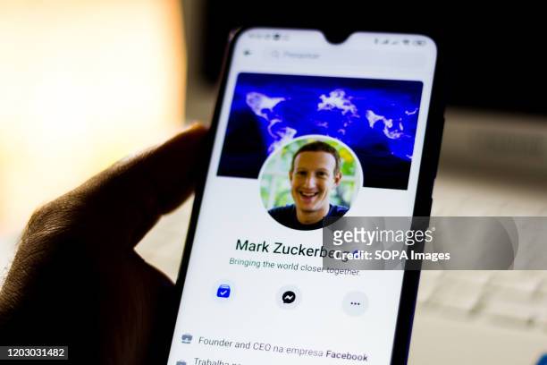 In this photo illustration the profile of Facebook founder Mark Zuckerberg seen displayed on a smartphone.