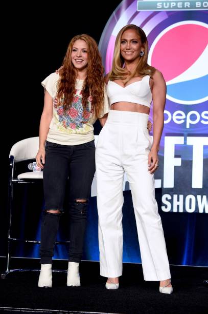 Shakira and Jennifer Lopez speak onstage during the Pepsi Super Bowl LIV Halftime Show Press Conference at Hilton Miami Downtown on January 30, 2020...