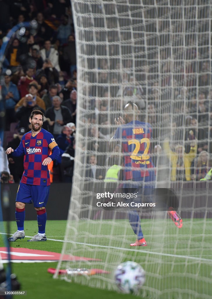Lionel Messi of FC Barcelona celebrates scoring the third goal during