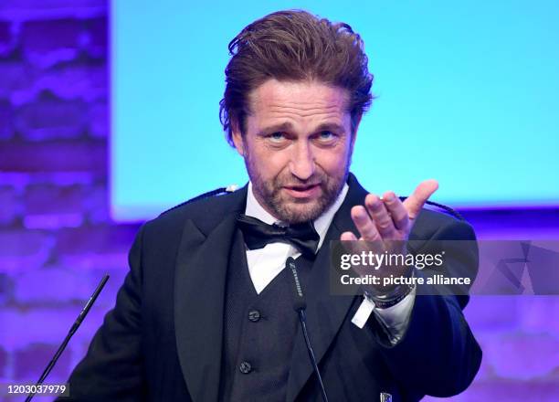 February 2020, Berlin: 70th Berlinale, Cinema for Peace Gala: Actor Gerard Butler . The International Film Festival takes place from 20.02. To ....