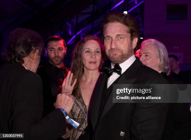 February 2020, Berlin: 70th Berlinale, Cinema for Peace Gala: Actress Jeanette Hain and actor Gerard Butler . The International Film Festival takes...