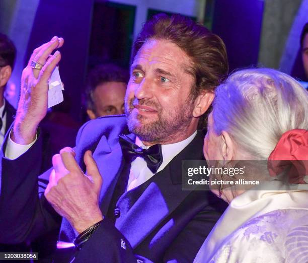February 2020, Berlin: 70th Berlinale, Cinema for Peace Gala: actor Gerard Butler and director Vanessa Redgrave. The International Film Festival...