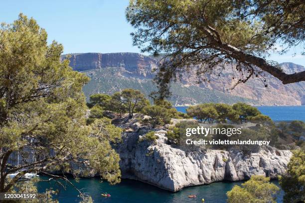 kayaking in calanques de marseille (massif des calanques) - calanques stock pictures, royalty-free photos & images