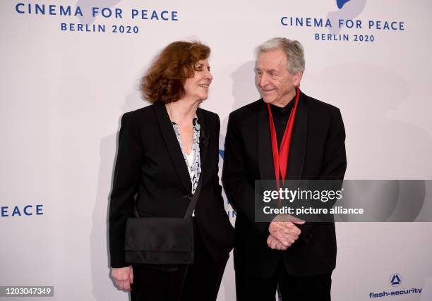 February 2020, Berlin: 70th Berlinale, Cinema for Peace Gala: Director Costa-Gavras and his wife Michèle Ray-Gavras. The International Film Festival...