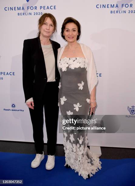 February 2020, Berlin: 70th Berlinale, Cinema for Peace Gala: Sandra Maischberger and director Sherry Hormann. The International Film Festival takes...