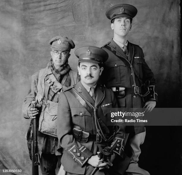 Actors Tony Robinson, Rowan Atkinson and Hugh Laurie a unit still from the filming of the BBC television series 'Blackadder Goes Forth', September...