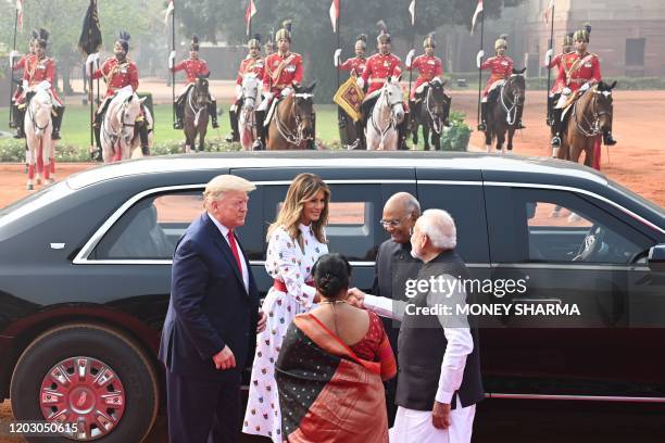 India's President Ram Nath Kovind, his wife Savita Kovind, Prime Minister Narendra Modi, US President Donald Trump and First Lady Melania Trump greet...