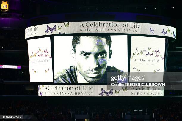 Screen shows photos during the "Celebration of Life for Kobe and Gianna Bryant" service at Staples Center in Downtown Los Angeles on February 24,...