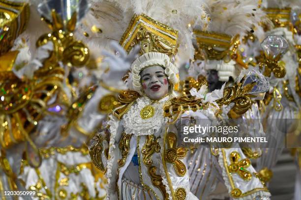 Members of Beija Flor samba school perform during the last night of Rio's Carnival parade at the Sambadrome Marques de Sapucai in Rio de Janeiro,...