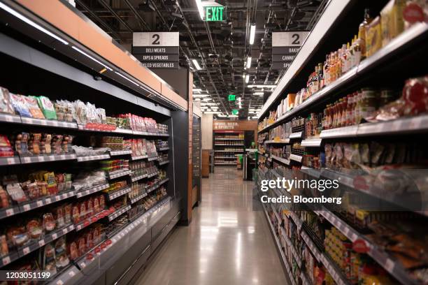 Food items sit on shelves during a tour of a new Amazon Go store in the Capitol Hill neighborhood of Seattle, Washington, U.S., on Monday, Feb. 24,...
