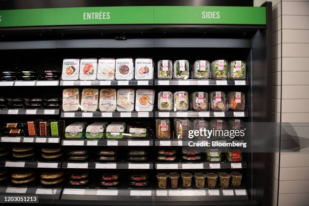 Refrigerated food items sit on shelves during a tour of a new Amazon Go store in the Capitol Hill neighborhood of Seattle, Washington, U.S., on...