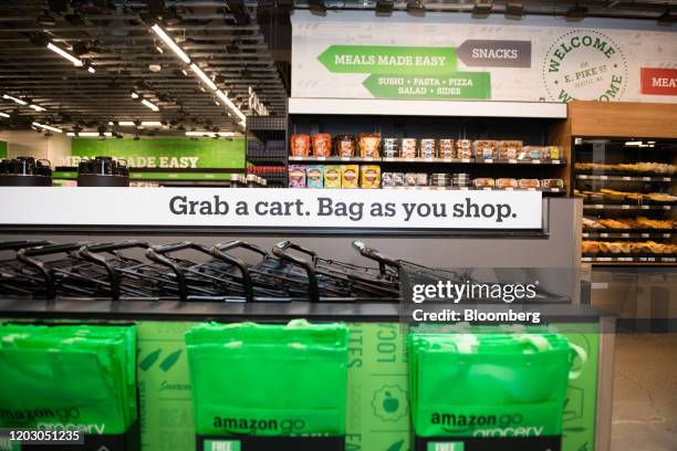 Grocery carts and bags are seen during a tour of a new Amazon Go store in the Capitol Hill neighborhood of Seattle, Washington, U.S., on Monday, Feb....