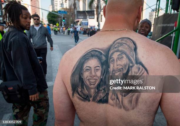 Fan shows his new Kobe tattoo outside the "Celebration of Life for Kobe and Gianna Bryant" service at the Staples Center in Downtown Los Angeles on...