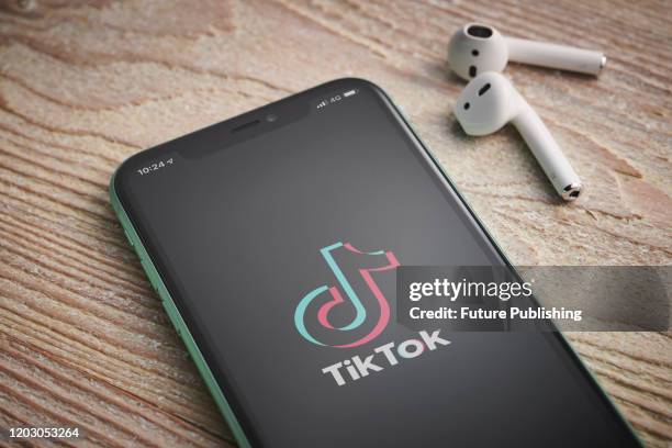 An Apple iPhone 11 smartphone with the TikTok video sharing app logo on screen, taken on January 27, 2020.