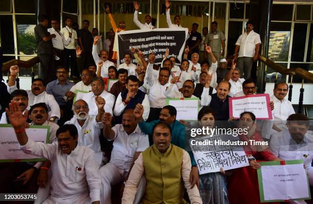 Leaders protest on the steps of Vidhan Bhavan as they demand loan waiver for farmers during the first day of the Budget session, on February 24, 2020...