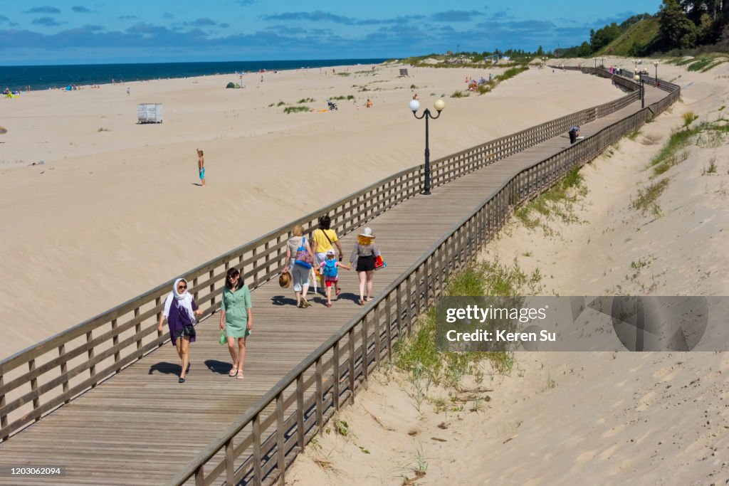 People Walking On Plankway On The Beach Yantarny Kaliningrad Oblast
