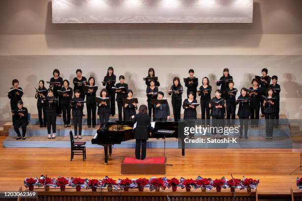 women's chorus concert - choir stage stock pictures, royalty-free photos & images