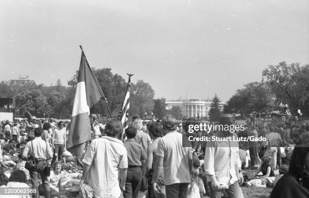 People march and hold flags during a student strike and protest against the Vietnam War on the National Mall in Washington, DC, following the Kent...