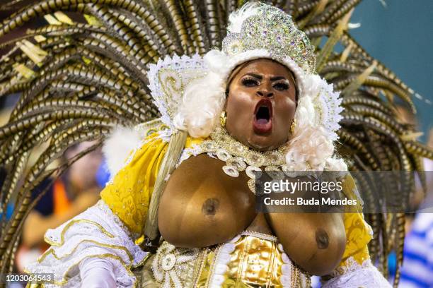 Singer Jojo Todynho of Beija-Flor de Nilopolis samba school performs topless during the second night of 2020 Rio's Carnival Parades at the Sapucai...