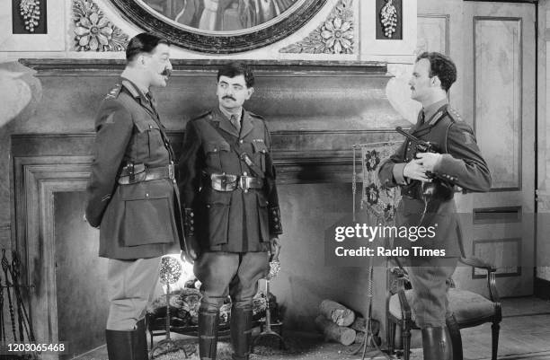 Actors Stephen Fry, Rowan Atkinson and Tim McInnerny in a scene from episode 'General Hospital' of the BBC television series 'Blackadder Goes Forth',...