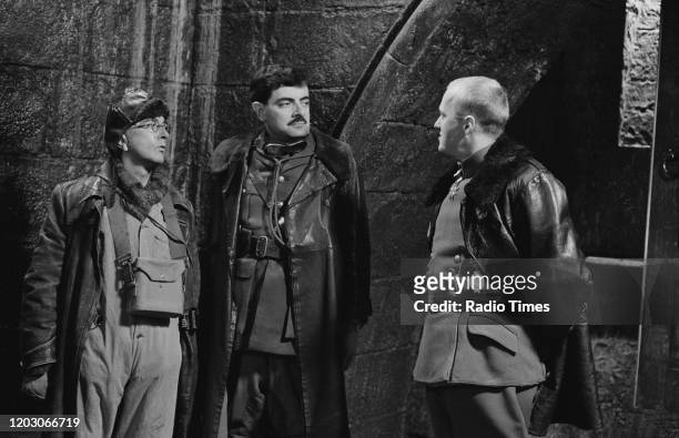 Actors Tony Robinson, Rowan Atkinson and Adrian Edmondson in a scene from episode 'Private Plane' of the BBC television series 'Blackadder Goes...
