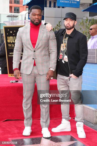 Curtis "50 Cent" Jackson and Eminem pose during a ceremony honoring 50 Cent with a star on the Hollywood Walk of Fame on January 30, 2020 in...
