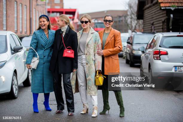 Janka Polliani seen wearing blue checkered coat, Tine Andrea wearing red Hermes bag, black blazer, Annabel Rosendahl wearing coat with print, Loewe...