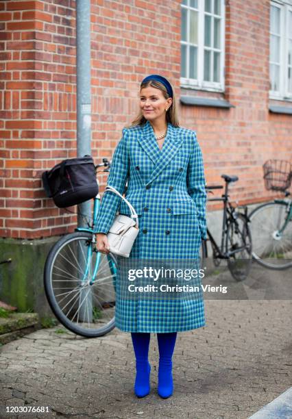 Janka Polliani seen wearing blue checkered coat outside By Malene Birger during Copenhagen Fashion Week Autumn/Winter 2020 Day 3 on January 30, 2020...