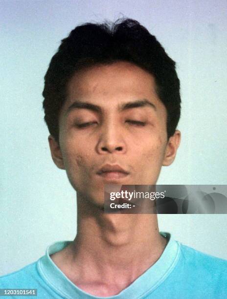 This police mug shot shows Singaporean Norishyam Mohamed Ali a former truck driver, one of two men sentenced to death by a Singaporean court 14...
