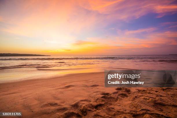 beautiful beach scenery with calm waves - margarita beach stock-fotos und bilder