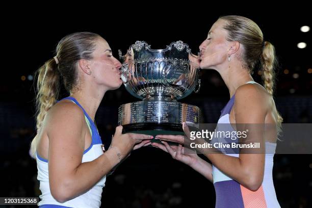 Timea Babos of Hungary and Kristina Mladenovic of France pose with the championship trophy after winning their Women’s Doubles Final match against...