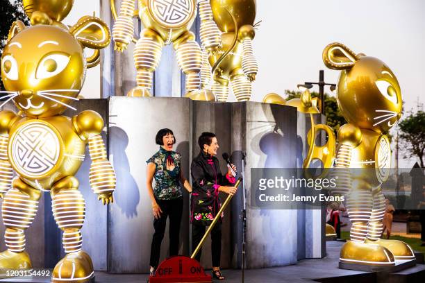 Lord Mayor of Sydney Clover Moore and artist of the rat sculpture, Claudia Chan Shaw pull the switch to light up the rat on January 31, 2020 in...