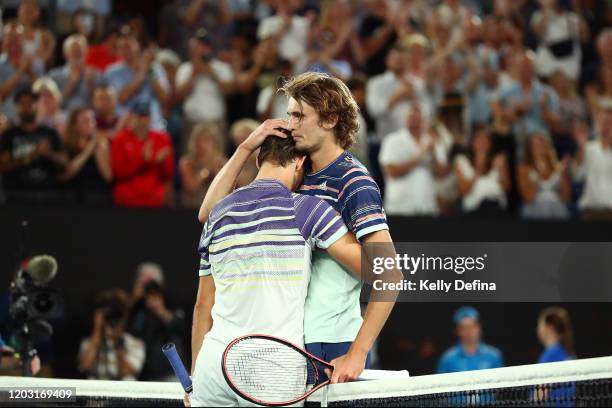 Dominic Thiem of Austria embraces Alexander Zverev of Germany after their Men's Singles Semifinal match on day twelve of the 2020 Australian Open at...