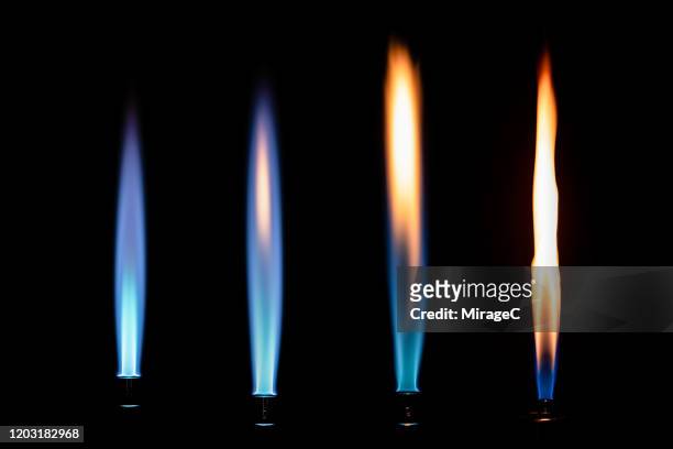 a collection of flames from bunsen burner - bunsen burner stockfoto's en -beelden