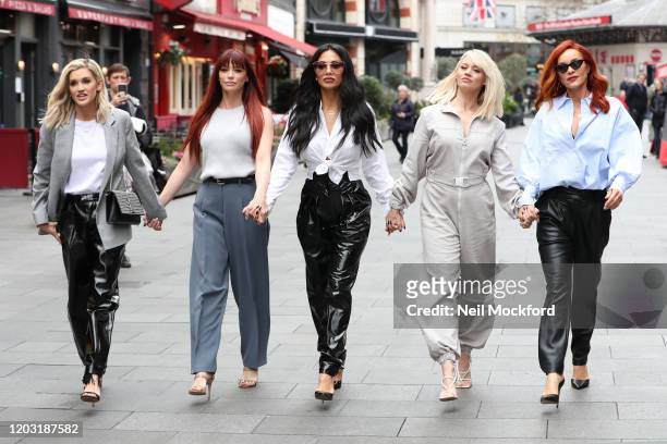 Ashley Roberts, Jessica Sutta, Nicole Scherzinger, Kimberly Wyatt and Carmit Bachar from the Pussycat Dolls seen at Global Radio Studios for an...